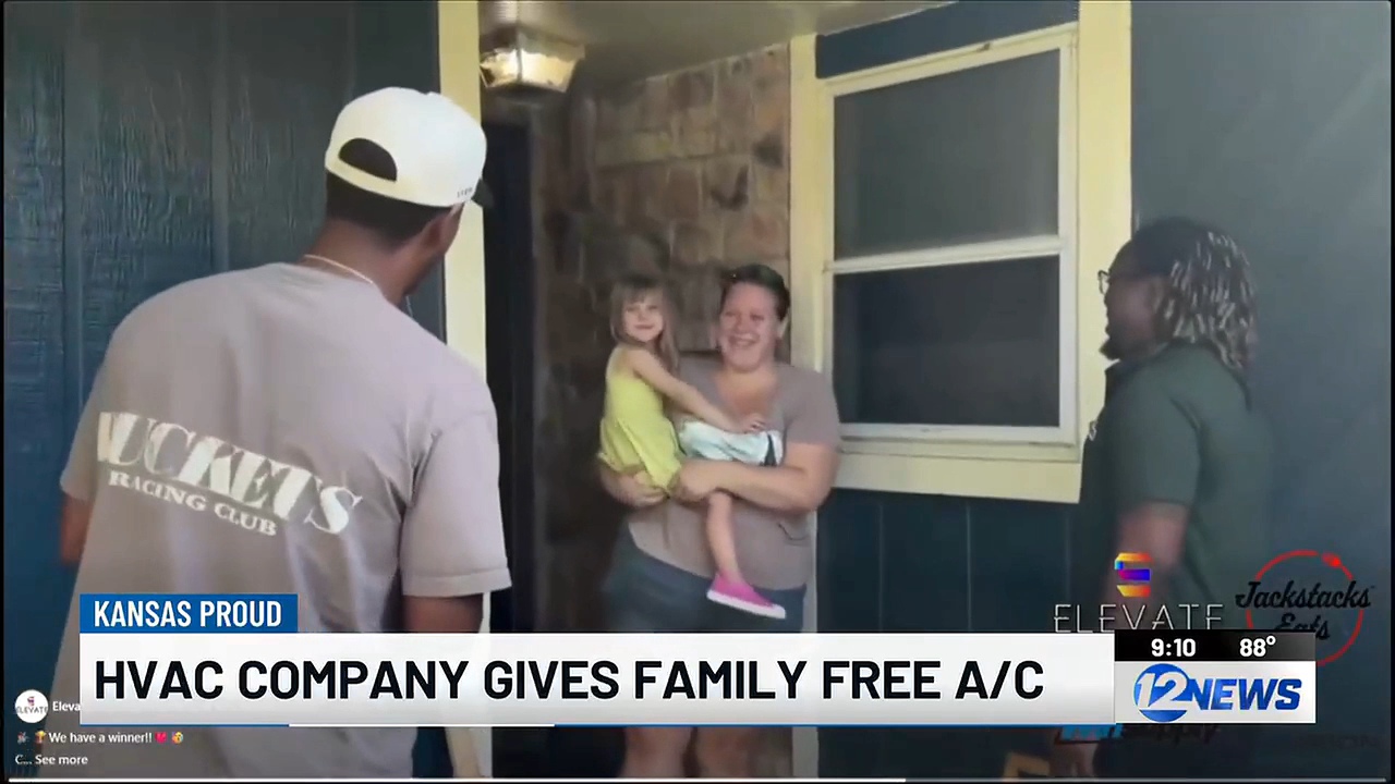 Chris and Josh at the Browns' front door in Haysville, Hannah laughing and holding her daughter